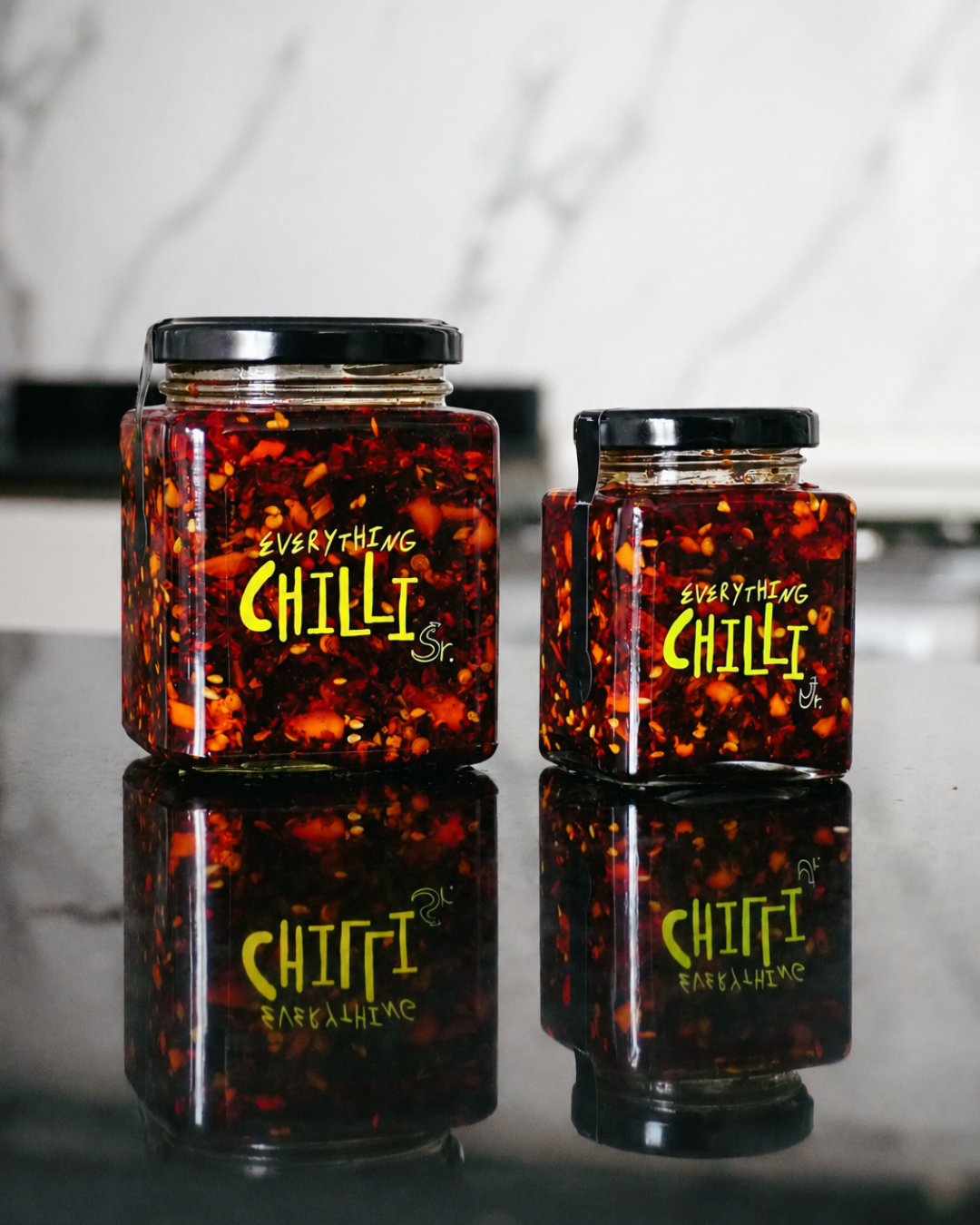 Everything Chilli Sr and Jr jars together lifestyle shot